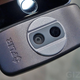 The FLIR One thermal imaging camera attached to the Lightning port of an iPhone.